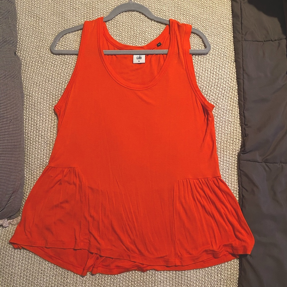 Reddish-orange tank top with peplum detail by Cabi